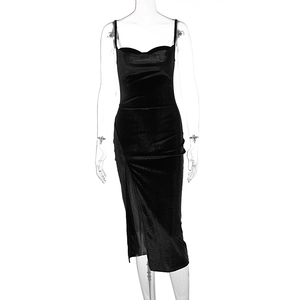 Detail view of black velvet slim fit dress with side slit on transparent mannequin
