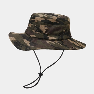 Detail of jungle camo boonie hat featuring mountain embroidery and metal vent eyelets
