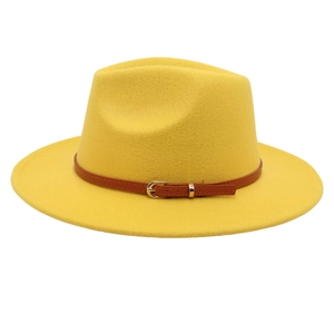 Elegant yellow felt jazz hat with a brown leather buckle strap on a clean white background