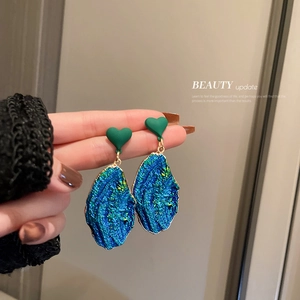 Irregular blue and green heart drop earrings with vintage textured fold design