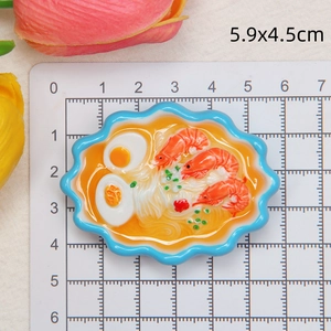 Top-down detail of a miniature seafood ramen bowl fridge magnet measuring 5.9x4.5cm