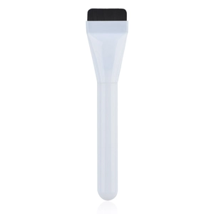 Flat ultra-thin foundation brush with dense synthetic bristles and white handle