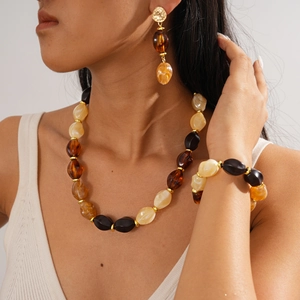 Bohemian 3-piece jewelry set with large acrylic beads showing necklace and bracelet fit