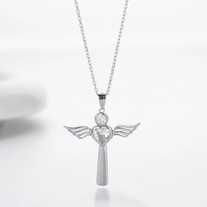 Detailed view of S925 silver cross pendant with angel wings and heart-shaped cubic zirconia