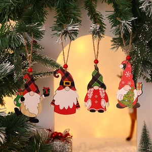Set of 4 painted wooden Christmas gnome ornaments hanging on festive snowy branches