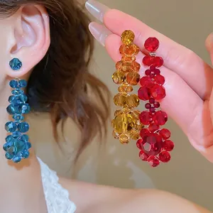 Elegant crystal flower tassel drop earrings in blue, amber, and ruby gemstone colors