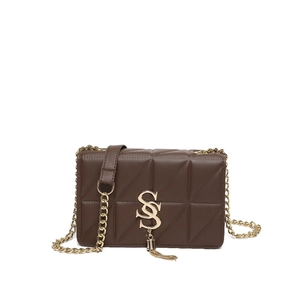 Quilted dark brown shoulder bag with golden chain and logo tassel pendant