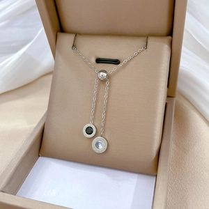 Titanium steel roman numeral pendant necklace with black and clear stones in a gift box