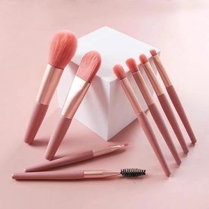 8-piece mini makeup brush set in Morandi pink with soft bristles and rose gold ferrule