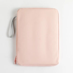 Close-up of sleek pink waterproof laptop sleeve with silver-grey handle and zipper detail