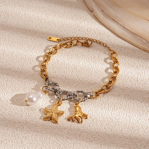 Ocean-themed stainless steel bracelet with starfish, octopus charms and pearl on stone base
