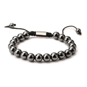 Handmade woven hematite bead bracelet with adjustable cord on white background