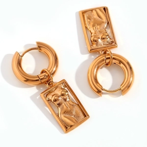 Artistic female torso pendant earrings in 18K gold plated stainless steel on white background