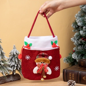 Christmas snowman gift bag in red fabric with plush trim and drawstring handle