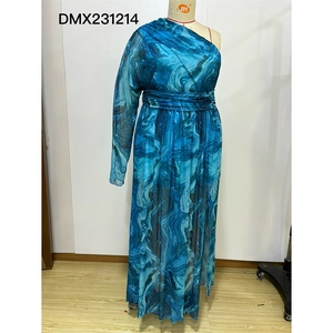 Detail of blue and green marble print dress showing the waist pleats and chiffon texture