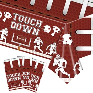 Detail of disposable football field tablecloth with Touch Down theme and helmet prints