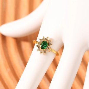 Gold stainless steel adjustable ring with emerald green zircon sunflower on a hand model