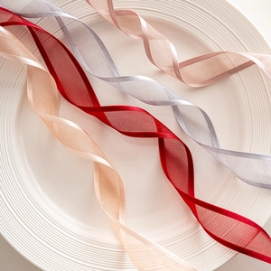 Elegant semi-transparent sheer Christmas tree ribbons in multiple festive colors for 2025