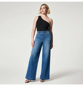 Women's casual high-waisted blue wide-leg jeans styled with a black slim-fit shoulder top
