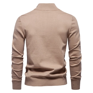 Detail view of khaki men's sweater back showing premium knit texture and ribbed hem