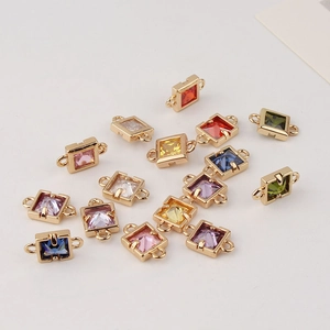 Detailed view of colorful geometric square zircon charms with gold-plated copper frames