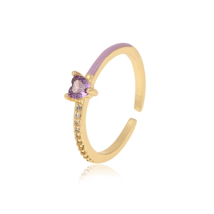 Detail of gold heart ring with purple zircon stone and lavender enamel accent