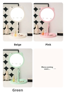 Cat-shaped makeup mirror with storage base available in beige, pink, and green colors