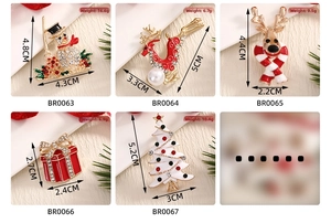 Detailed view of Christmas brooch set featuring reindeer and snowman with size dimensions