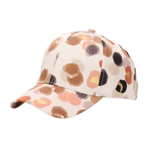 Detailed macro view of cotton baseball cap fabric with glitter artistic floral pattern