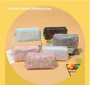 Detail of sequin makeup bags with pearl zippers in various colors and trendy storage style