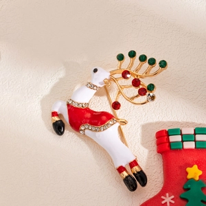 Detailed view of Christmas reindeer brooch with colorful rhinestones and enamel finish