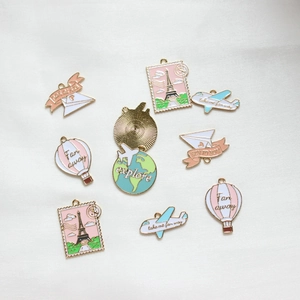 Travel themed enamel alloy charms with Eiffel Tower, hot air balloon and world globe designs