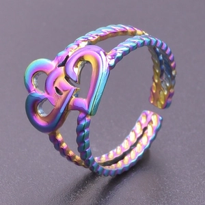 Detail of rainbow-plated double layer ring with heart cutout and adjustable band