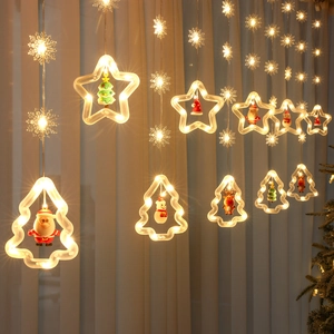 LED Christmas star and tree curtain lights with Santa reindeer dolls in warm white
