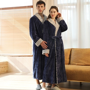Navy flannel couple robes with plush grey fleece collars and waist belts in home setting
