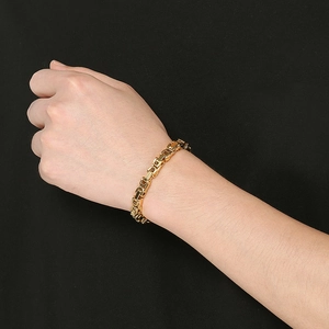 Men's gold plated titanium steel Byzantine link chain bracelet on wrist