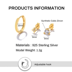 Detail of 925 sterling silver earring set with star and cubic zirconia studs