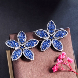 Chic gunmetal leaf earrings with pave-set navy blue and white cubic zirconia crystals