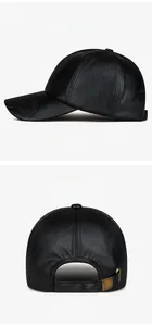Vue détaillée de la casquette de baseball en cuir PU noir avec texture gaufrée et boucle
