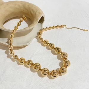 Exaggerated 18K gold bead chain necklace with adjustable extender and lobster clasp