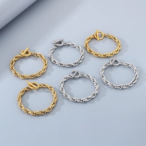 Detail of titanium steel rope chain bracelets in gold and silver with OT toggle clasp