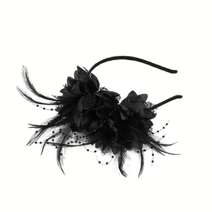Detail of black fascinator headband featuring feathers lace flowers and elegant beads