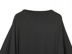 Detailed view of the elegant round neckline and high-quality black crepe fabric texture