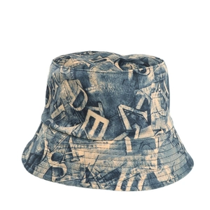 Retro denim blue bucket hat with all-over abstract letter print and washed texture