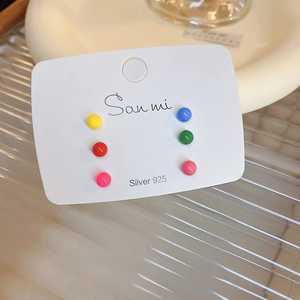 Detail of 6-piece colorful bead stud earring set in 925 silver on branded card