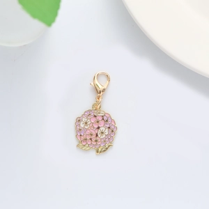 Detail of pink hydrangea flower keychain with gold lobster clasp for bags and keys