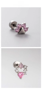 Détail des boucles d'oreilles en acier titane avec zircon rose en forme de chat et cœur