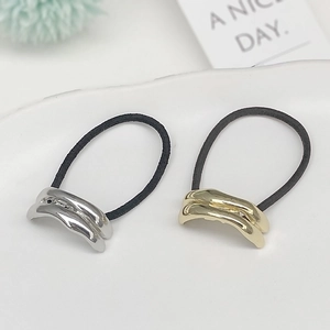 Minimalist U-shaped gold and silver wavy metal hair rings with black elastic bands