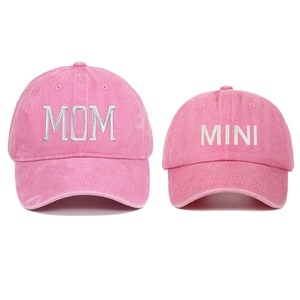 Matching mother and child washed pink baseball caps with MOM and MINI embroidery