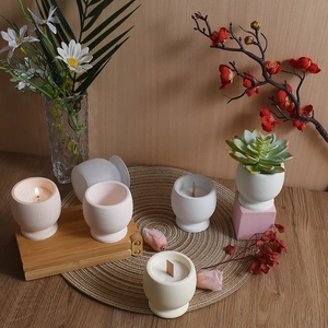 Scented candle in textured striped ceramic jar with eco-friendly wood wick for home decor